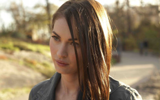 Woman long hair serious outdoor - a sidewalk free wallpaper