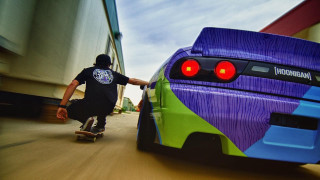 Man skateboard colorful car street - motion blur free wallpaper
