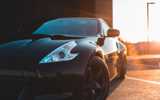 Black sports car parking lot 35 - sunrise time free wallpaper