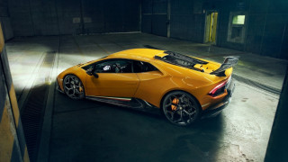 Yellow sports car garage hood 2 - its hood open free wallpaper