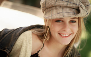 Woman smiling hat leather jacket - young free wallpaper