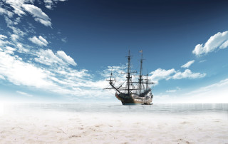 Large ship beach ocean sky - sandy free wallpaper