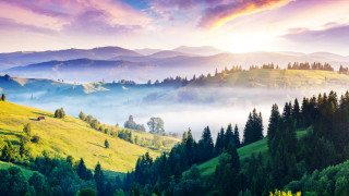 Mountain range foggy valley distant - free spring wallpaper