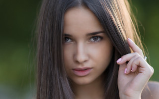 Woman long hair serious portrait 6 - shaded free wallpaper