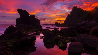 Sunset rocky beach purple clouds - a sunset over a rocky beach free wallpaper