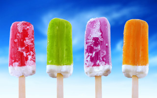 Four popsicles colored toppings blue - a stick in front free wallpaper
