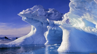 Iceberg blue sky water ecological - a large iceberg free wallpaper
