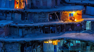 Cityscape fire man neon rain - free winter wallpaper