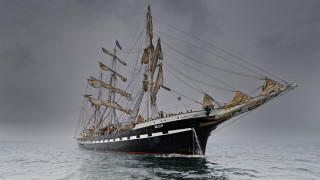 Large black and white boat - cloudy free wallpaper