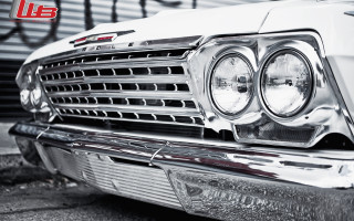 Car headlights graffiti wall photorealism - a close up of a car free wallpaper