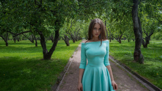 Woman blue dress park sunlight - the background and grass free wallpaper