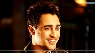 Smiling man holding fan dark - a fan free wallpaper