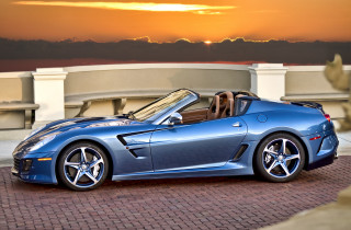 Blue sports car sunset building - a blue sports car free wallpaper