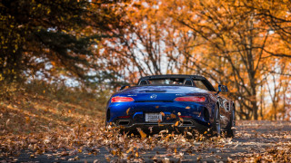 Blue sports car fall leaves - panfuturism free wallpaper