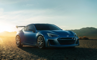 Blue sports car desert sunset 2 - a desert area free wallpaper