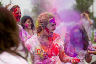 Colored powder festival people celebration - one woman free wallpaper