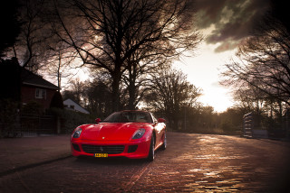 Red sports car cobblestone street 2 - street free wallpaper