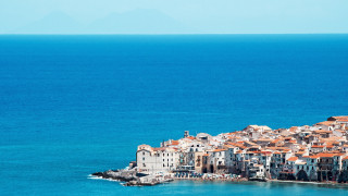 Small island buildings boat ocean - cimabue free wallpaper for desktop