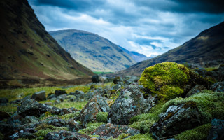 Mossy rock valley mountains clouds - a moss free wallpaper