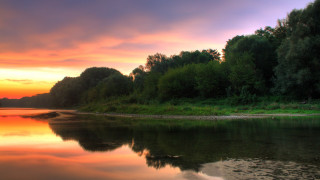 Sunset river trees water mountain - the foreground and a body of water free wallpaper
