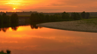 Sunset river bridge trees grassy - warm color free wallpaper