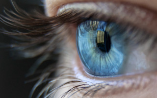 Blue eye iris building reflection - new objectivity free wallpaper