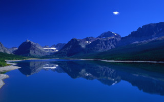 Mountain range reflection lake moon - a few tree and bushes free wallpaper