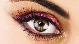 Woman eye purple yellow pink - a womans eye free wallpaper