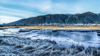 Snowy field mountain river beach - free mountains wallpaper