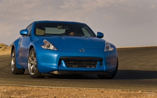 Blue sports car desert road - a road in the desert free wallpaper