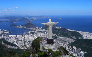 Christ overlooking rio ocean skyline - blue sky free wallpaper