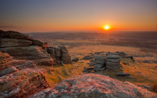 Sunset rocky landscape trees ocean - stunning free wallpaper