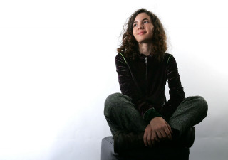 Woman sitting stool legs crossed - chernik free wallpaper