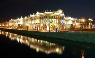 Neoclassical flemishbaroque clocktower night cityscape - a bridge in front free wallpaper
