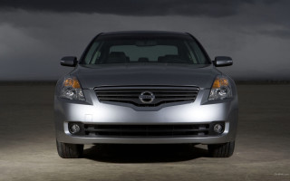 Silver car parking lot dark - a black car in the foreground free wallpaper