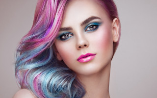 Colorful hair makeup serious portrait - her face and shoulder free wallpaper