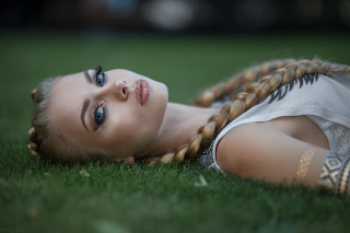 Girl braids lying grass dandelion - a young girl free wallpaper