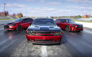 Three red black cars driving - a track free wallpaper for desktop