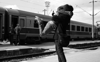 Man skateboard train station romantic - a man holding free wallpaper