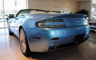 Blue sports car showroom woman - other car free wallpaper