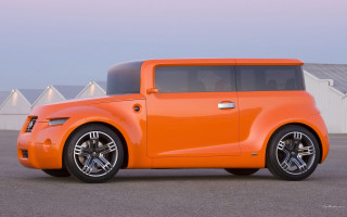 Orange car parking lot building 2 - an orange car free wallpaper