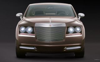 Brown car lights on black - a brown car free wallpaper