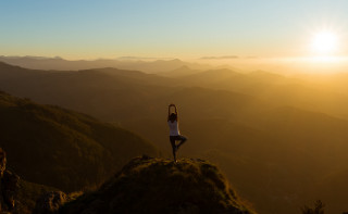 Yoga woman mountain sunset sky - top of a mountain free wallpaper