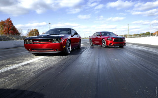 Red cars race track cloudy - white cloud free wallpaper