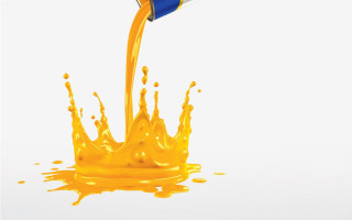 Yellow liquid pouring blue cup - action painting free wallpaper