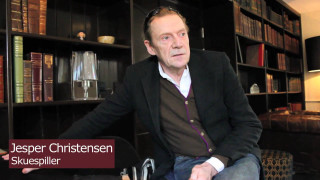 Man sitting chair book shelf - a lamp free wallpaper