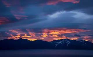 Sunset mountains clouds lake boat - blue free wallpaper