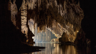 Cave lake boat night lights - a cave free wallpaper