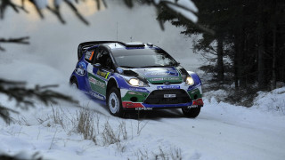 Rally car snow forest motion - in a forest area free wallpaper