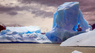 Iceberg person mountain range ecological - the water near a mountain range free wallpaper